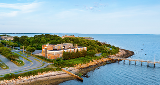 Drone shot of SMAST building and pier