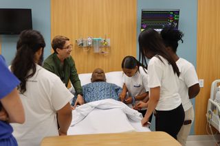 nursing students with simulator lab