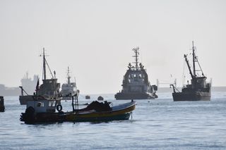 fishing boats on the water near coastal Chile