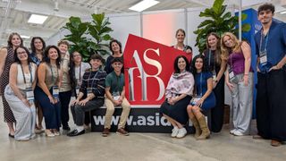 Botti-Salitsky and McGoldrick pose with UMass Dartmouth Interior Architecture + Design students at the ASID National Award Ceremony.