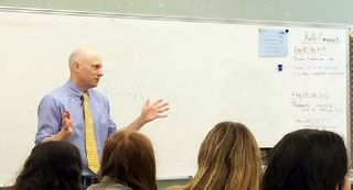 Law Professor Richard Peltz-Steele visits a classroom at Stonington High School, Connecticut
