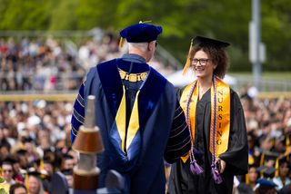 Nursing Student Walking at Commencement