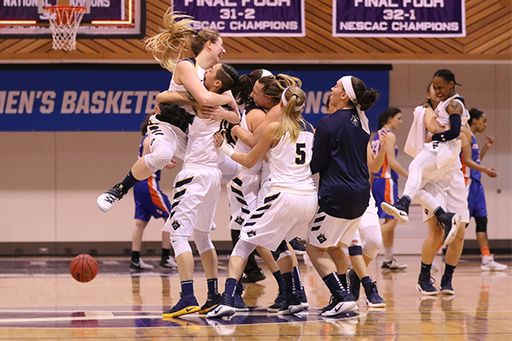 Women's basketball team celebrating