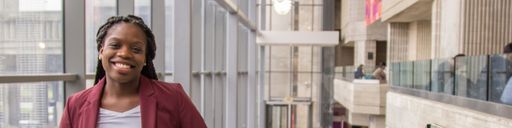 UMass Dartmouth student Kharlita Chambers-Walker in the Claire T. Carney Library.
