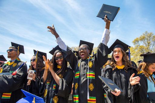 Group of students celebrating at commencement