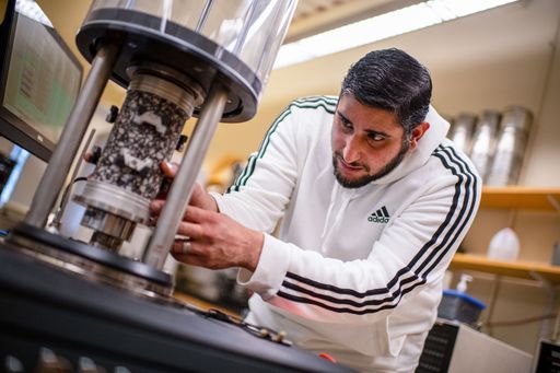 PhD student, Ibrahim Abdalfattah, Phd '23, veteran, conducting research in the Highway Sustainability Research Center la