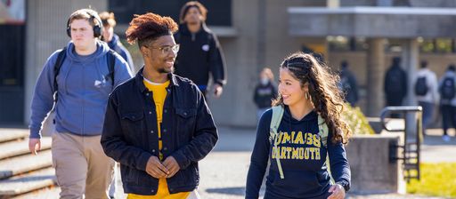 Students walking across the campus quad