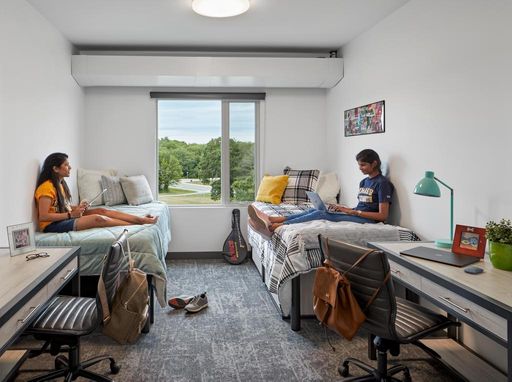 Students in their dorm room in Balsam Hall