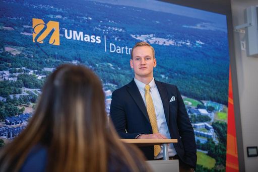 Admissions staff meeting with students at the Welcome Center.
