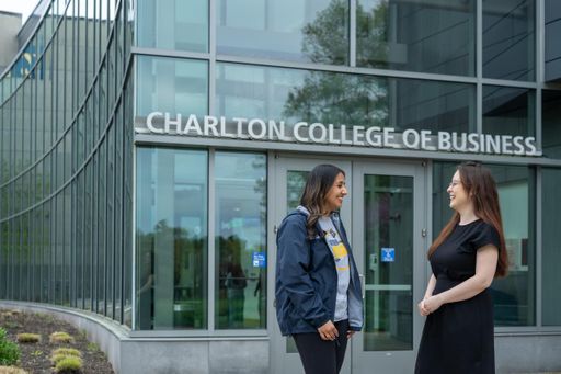 2 students in front of CCB