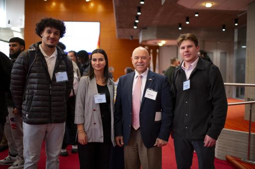 Students and alumni at networking event