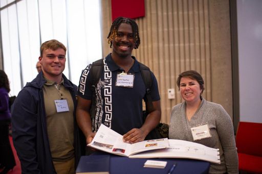 CVPA alumna with students at networking event