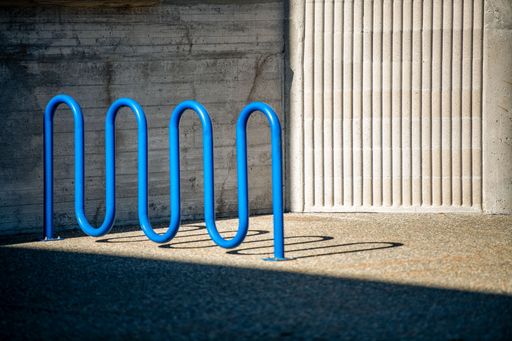 Bike rack located outside one of campus' many buildings