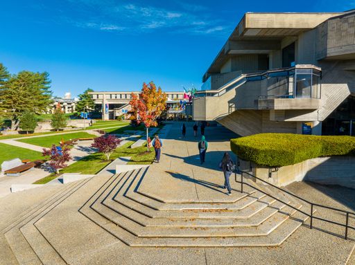 Students walking along the campus quad