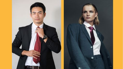 Male and female professional, both wearing dark suits and red ties, with serious expressions on their faces.