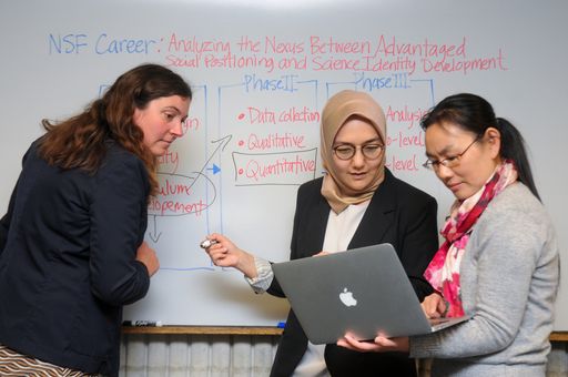 Professor Shakhnoza Kayumova with graduate students