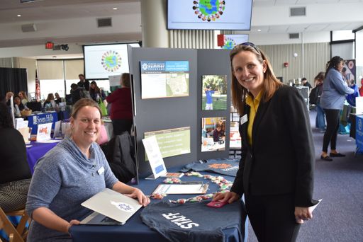 Jennifer Vincent visiting tables at a career fair