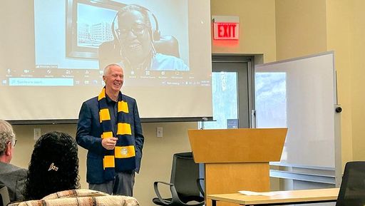 Chancellor Mark Fuller congratulates BayCoast Scholars on their admittance to UMass Dartmouth