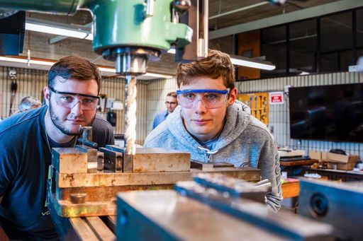 Mechanical Engineering students, working on capstone projects, in the machine shop.