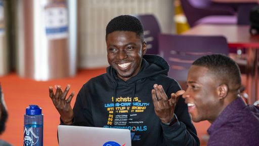 Engineering students socializing in the Library Living Room