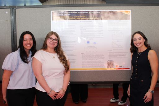 Nursing students with their research poster at Scholarship Day 2026