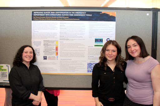 Nursing students with their research poster at the 2026 Scholarship Day