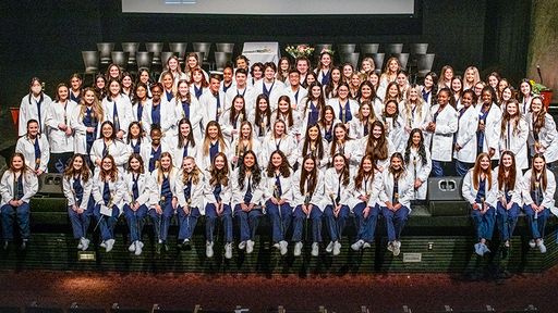 Class of 2025 nursing students on stage