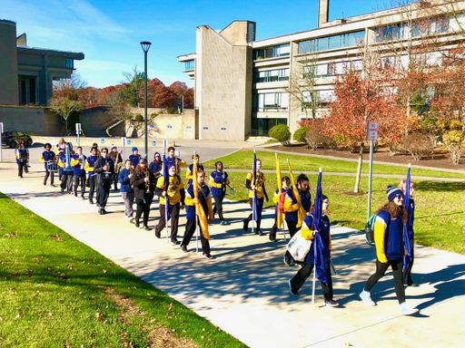 Corsair band lined up down the sidewalk