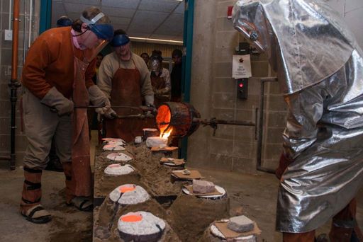 CVPA students pouring molds.