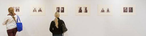 People viewing artwork at the gallery.