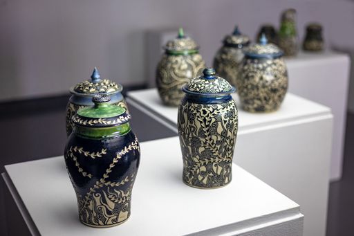 Subconscious Sgraffito, 2023, wide detail photo of first grouping of jars, 11 ½ x 7 in, 11 ½ x 6 ½ in, 12 ½ x 6 in.