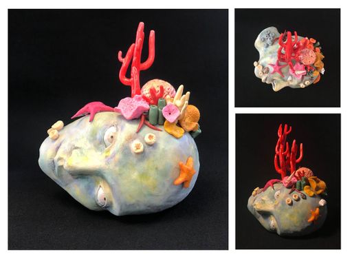HONORABLE MENTION - Isadora Brandao (senior), My Decapitated Head, 2023, sculpture, acrylic paint, shells | Barnstable High School (Barnstable, MA), Teacher: Matt Kemp