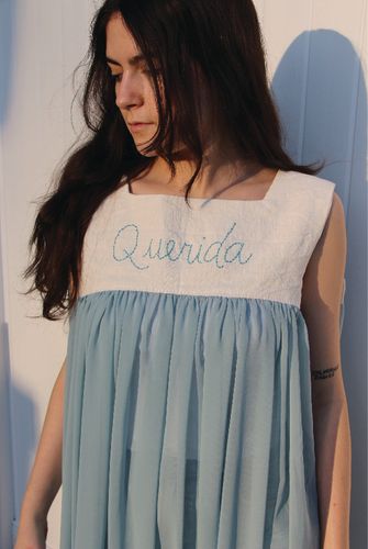 Querida, 2025, Querida hand embroidered babydoll dress.