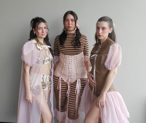Three Looks, 2026, group of three garments featuring sheer pink layers, brown tones, and lace up detailing.