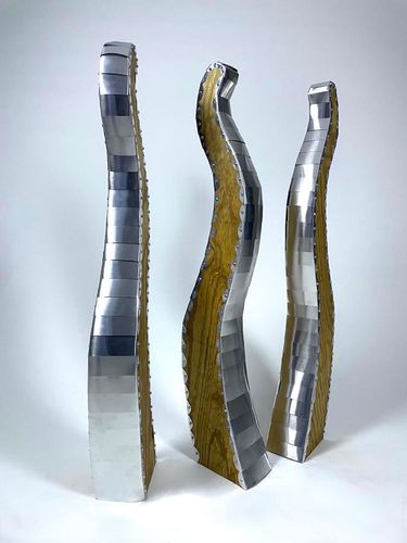 Three Graces, 2025, aluminum and oiled plywood, three pieces each 48 x 6 x 18 in.
