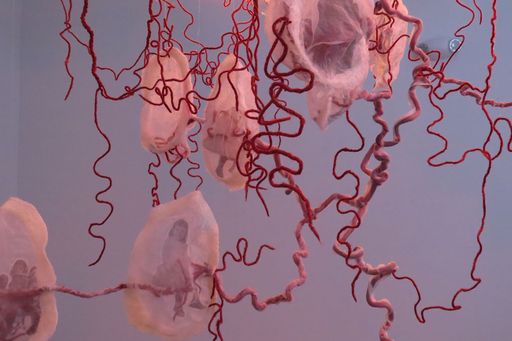 The Cord of Life (details), 2021, hand-felted merino wool, organza silk, wire, 6.5 feet diameter x 6 feet height