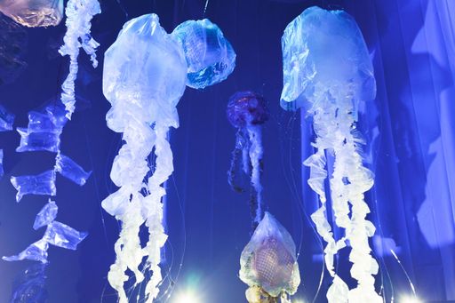 Blooms (detail), 2022, upcycled plastic, electric synchronous motors, filament, projection, screen, cellophane, led lights, sound, ~25’ x22’ x 10’