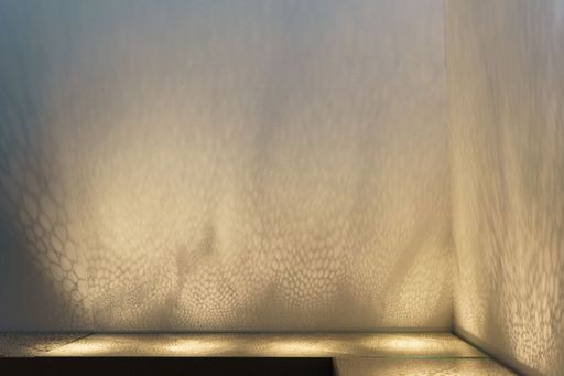 Breathing Room (detail), 2022, clay slip, glass, cabinets, led lights, sound, 112” x 96” x 20”