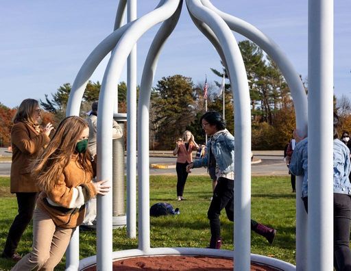 Visitors to UMass Dartmouth interact with Nancy Holt's Spinwinder (1991) on the occasion of its 30th anniversary celebration. Photo: Chris Diani