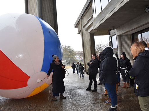 Participatory Art with Artist Negar Farajian, giant beach ball on campus quad