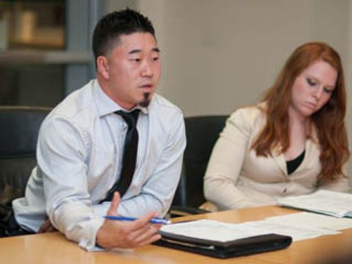 Enactus executive board member students, President Ryan Bone and Vice President Amanda Litterio