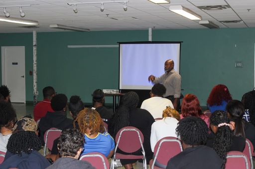 Dr. Mo presenting at an FDUH Leadership Retreat