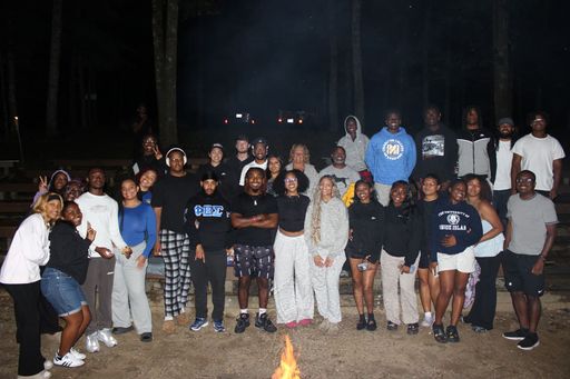 Students enjoying a campfire on the FDUH Leadership Retreat