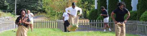 Students enjoying a sack race at an FDUH Leadership Retreat