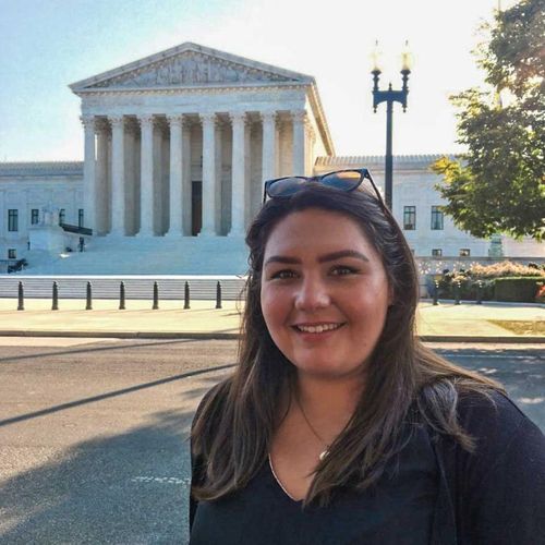 Alexandria Murphy, JD '21 standing across the street from the U.S. Supreme Court