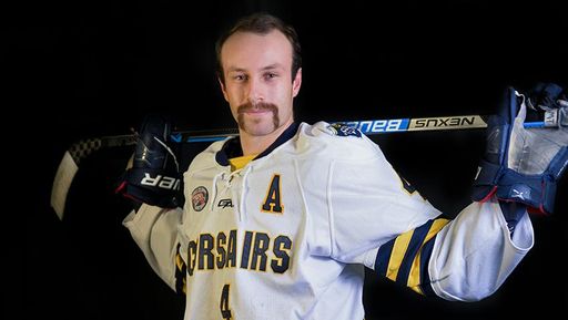 Cade Hanley '24, poses at the hockey team's media shoot before the 2022-23 season.