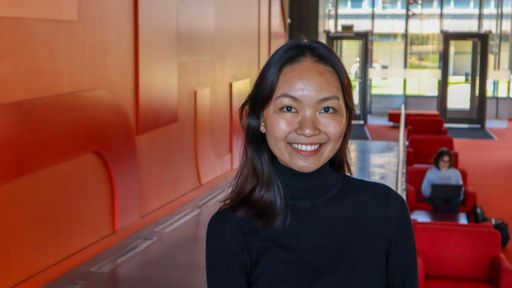 Junior chemistry major Linh Dan Nguyen pictured in the Claire T. Carney Library