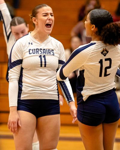 Kristjánsdóttir celebrates with Chelsea Sanker after a point.