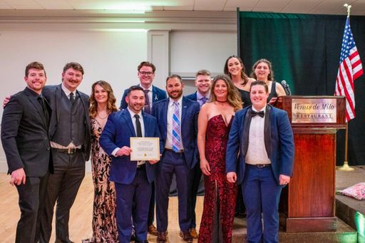 Trocchio and the Veterans Law Association accept an award for Student Organization of the Year at the annual Barristers Ball