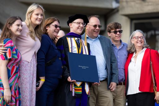 Sean Perrine pictured with family following the commencement ceremony.
